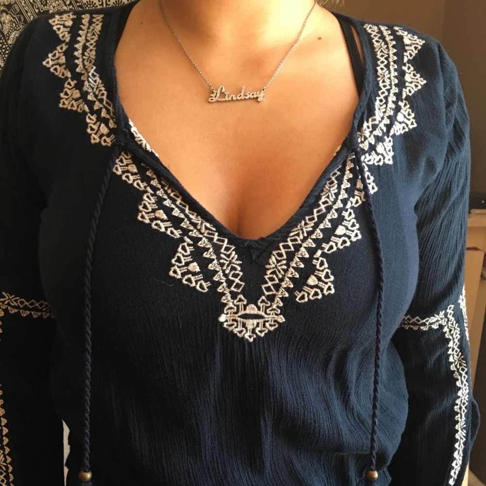 navy blue bohemian top with white stick details